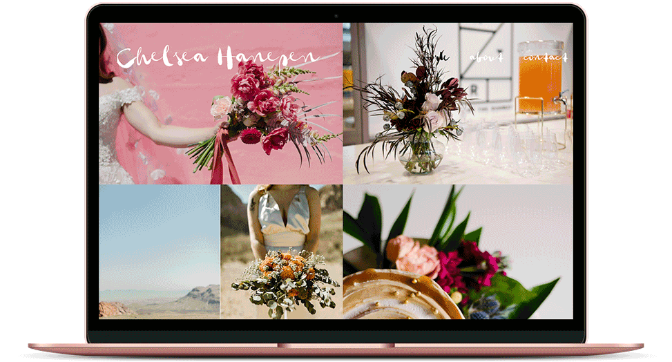 Moving image of laptop with floral design images scrolling.