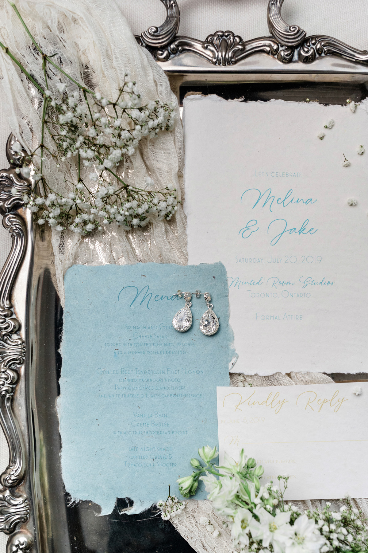 An overhead photo of an invitation suite.