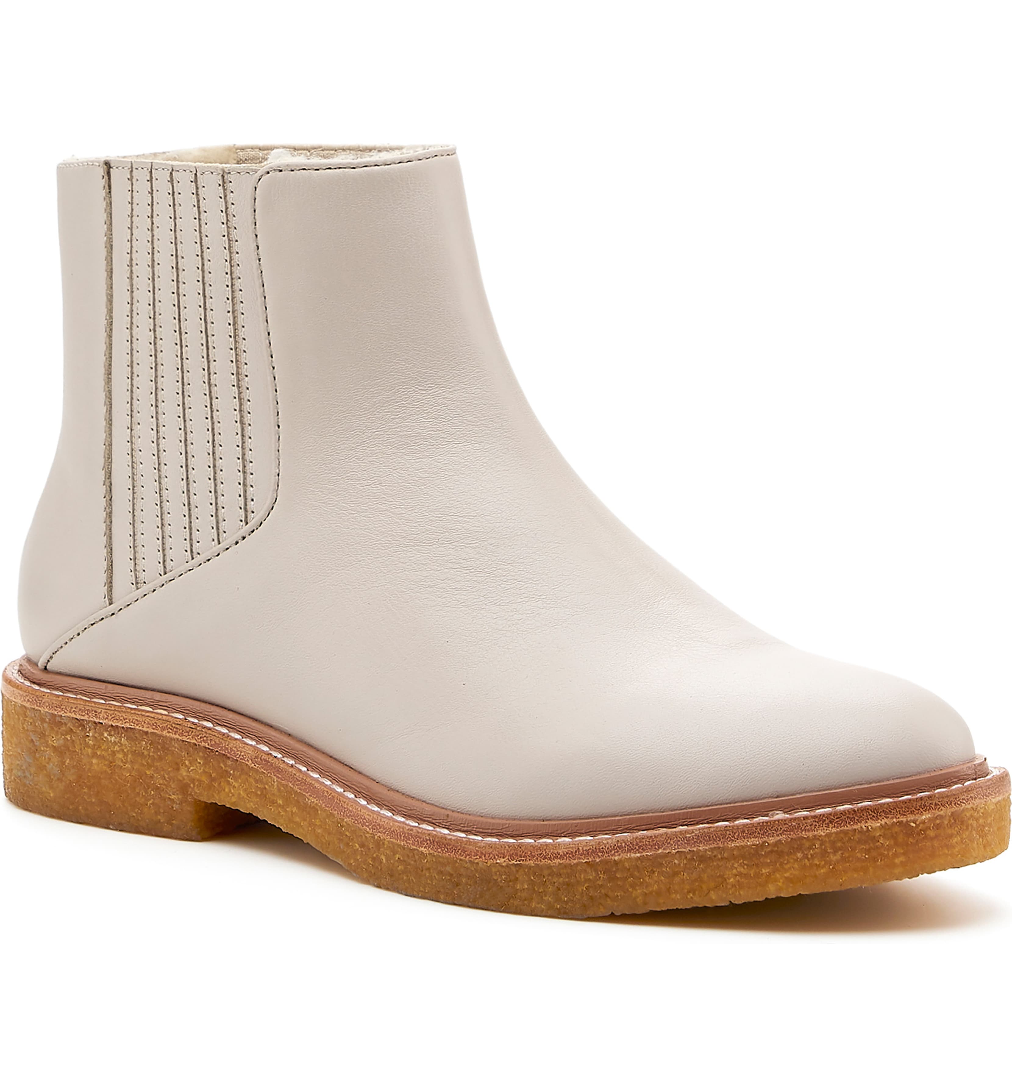 A comfortable white Chelsea boot.