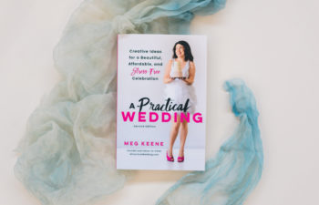 Flat lay image of Meg Keene's new edition of her book A Practical Wedding