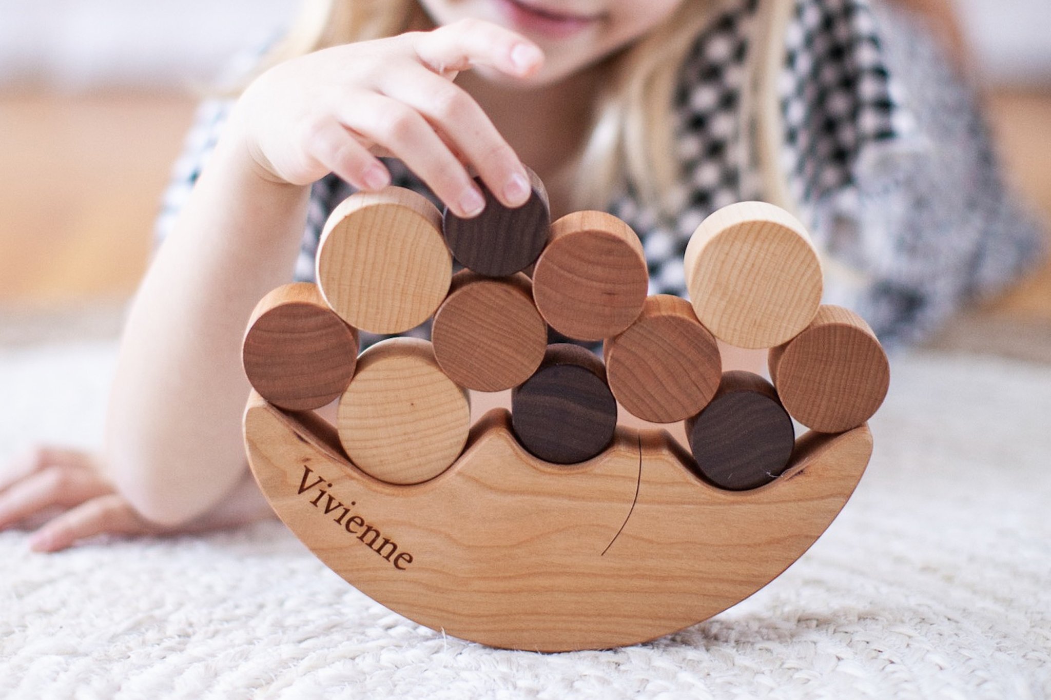 A wooden puzzle game.