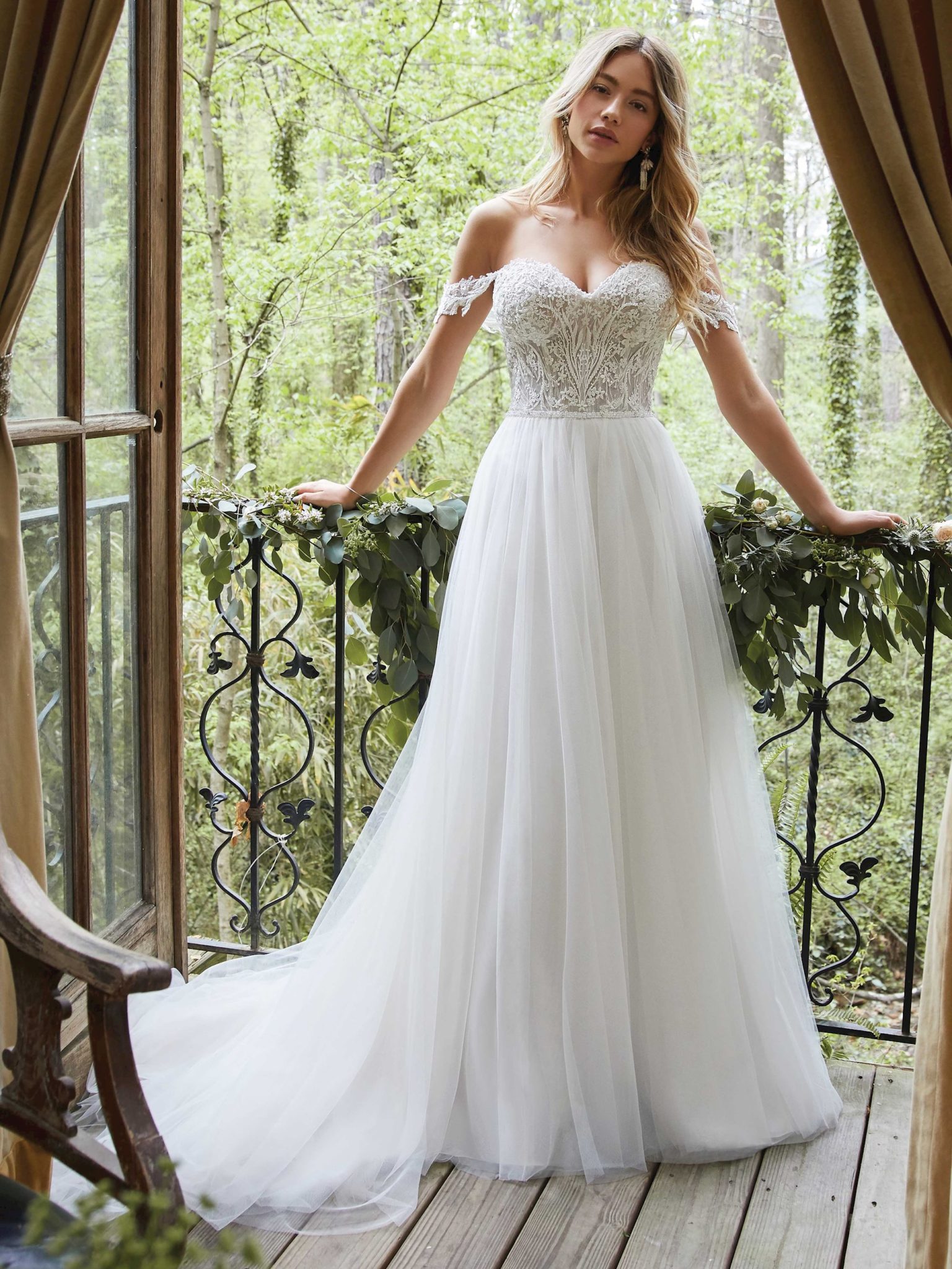 A woman wears Nia by Maggie Sottero