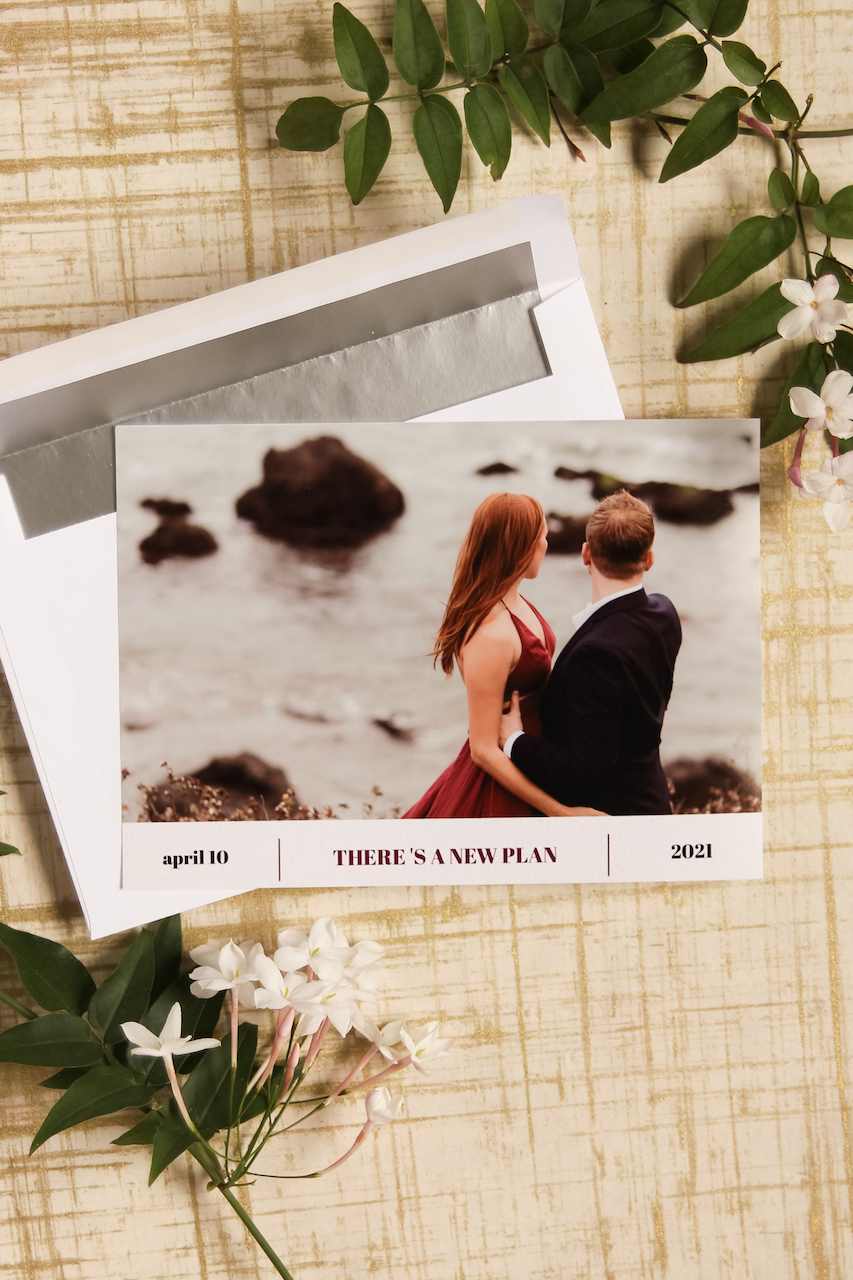 photo of a change the date wedding invite 