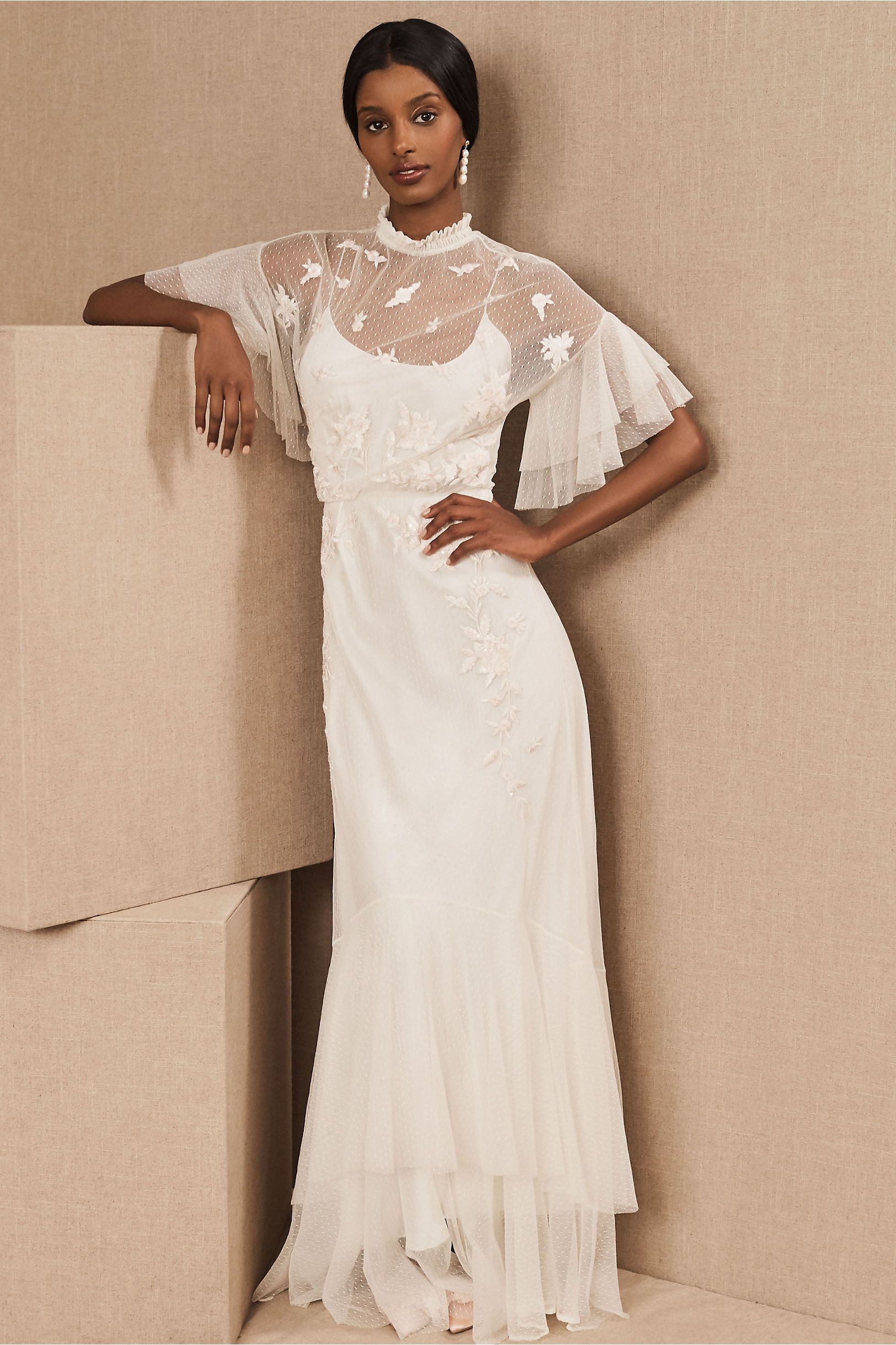 Woman with dark hair in BHLDN white lace wedding dress