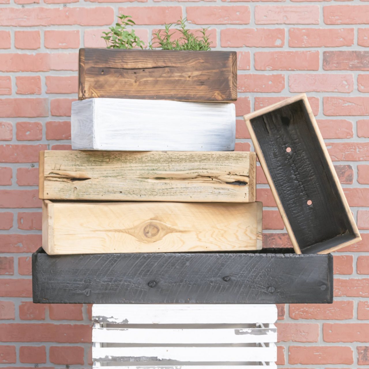 wood planter boxes as backyard wedding supplies and centerpieces