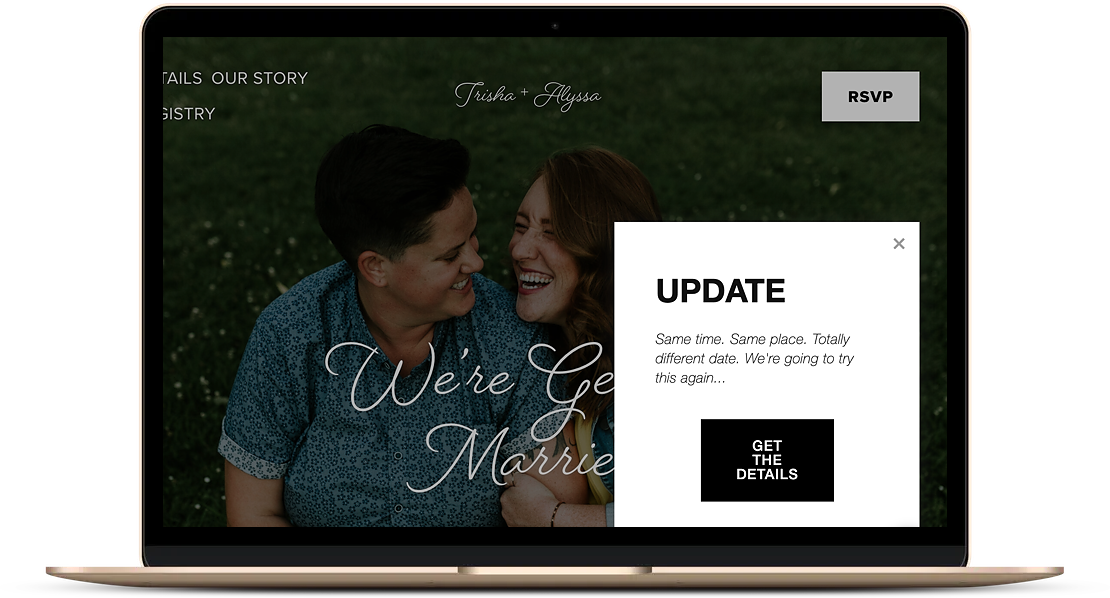 laptop showing wedding website with update pop up regarding date change