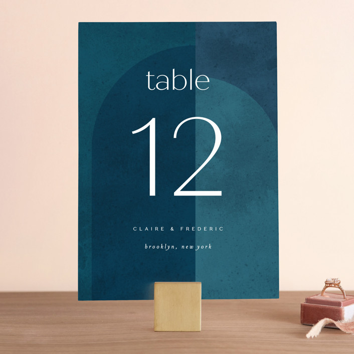 arched blue table numbers are unique 2020 fall wedding ideas