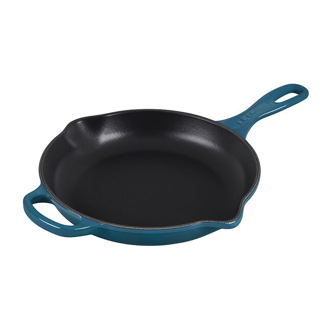 Blue accented cast iron skillet is a perfect anniversary gift