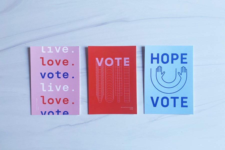 Three "vote" postcards