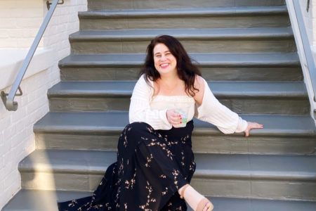 Meg sitting on steps