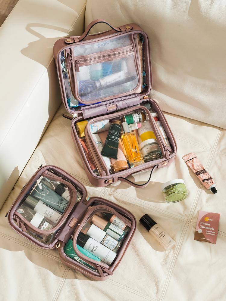 Leather and clear plastic travel cosmetics case
