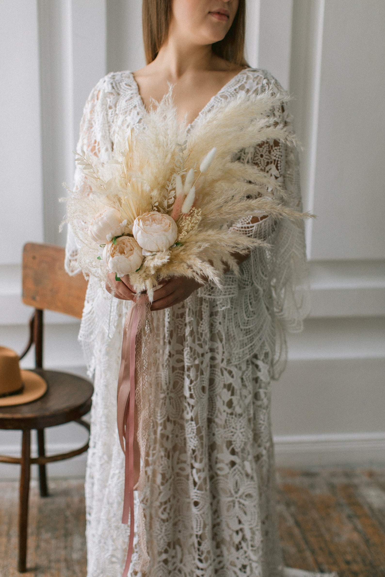 bride holding dried bouquet